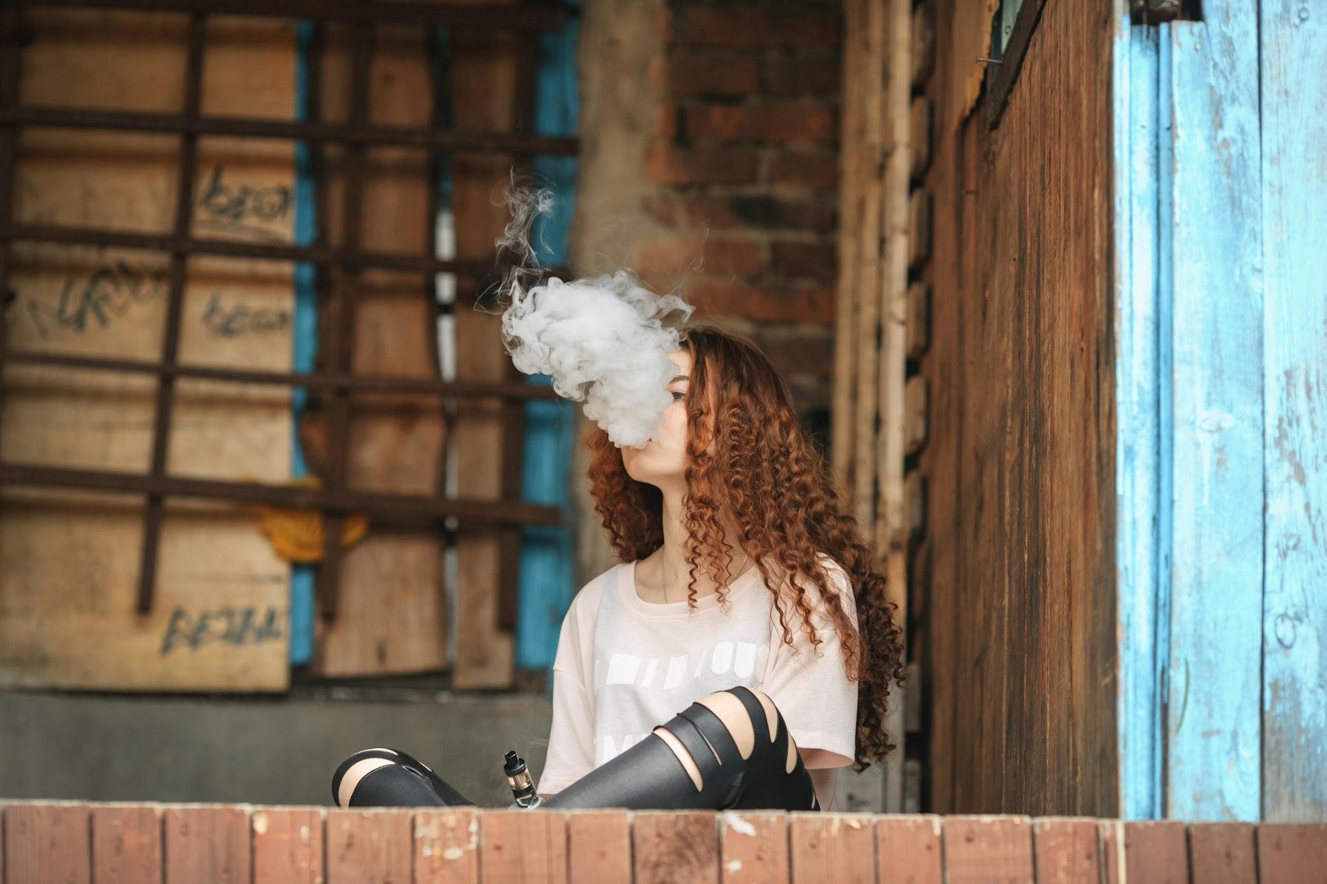 Curly haired smoking