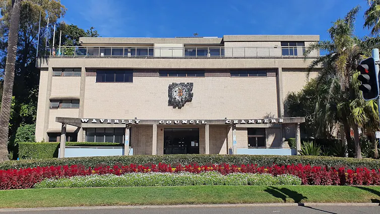 A council building on green grass.