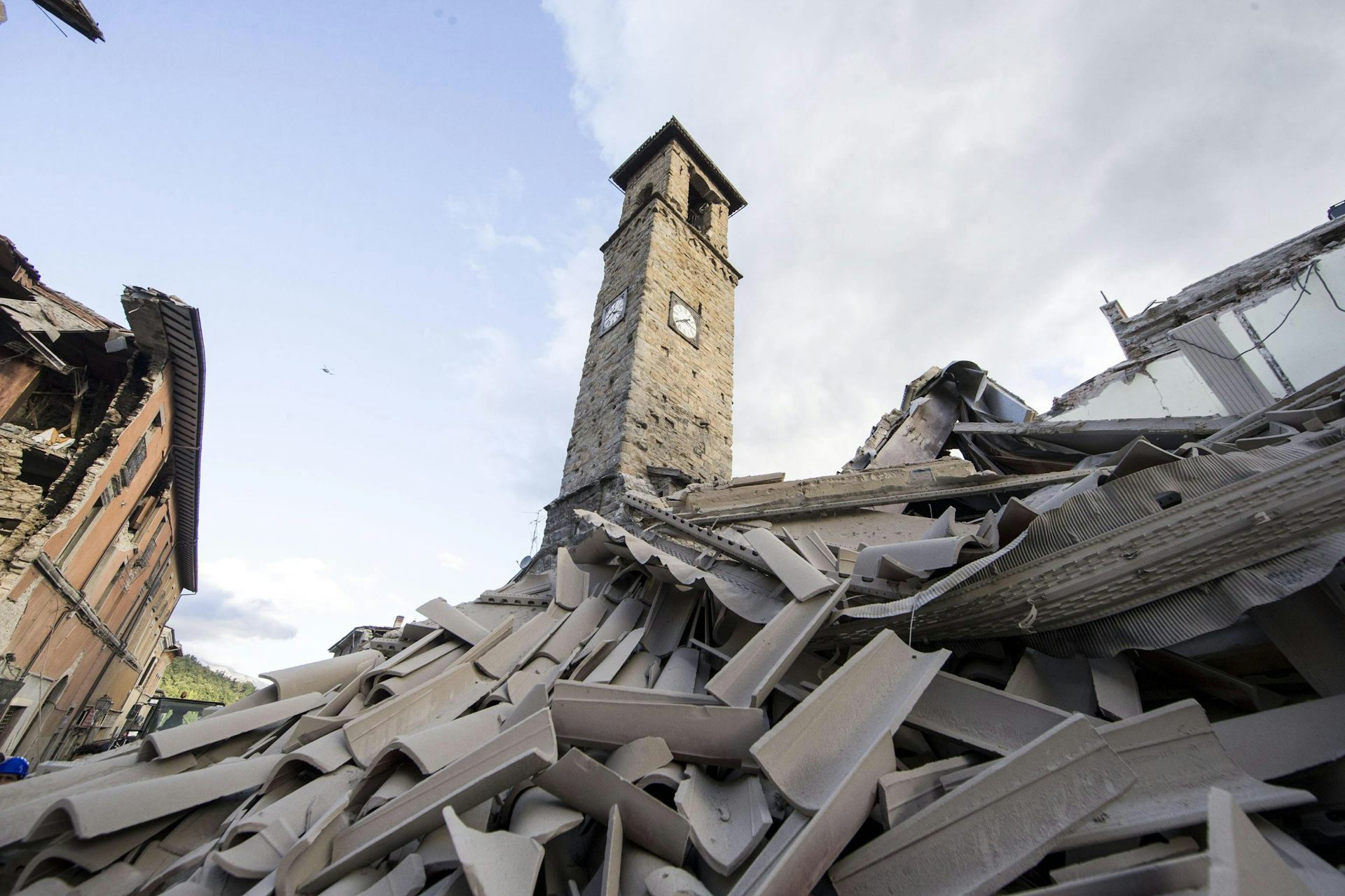 Still standing: how an ancient clock tower survived Italy's deadly