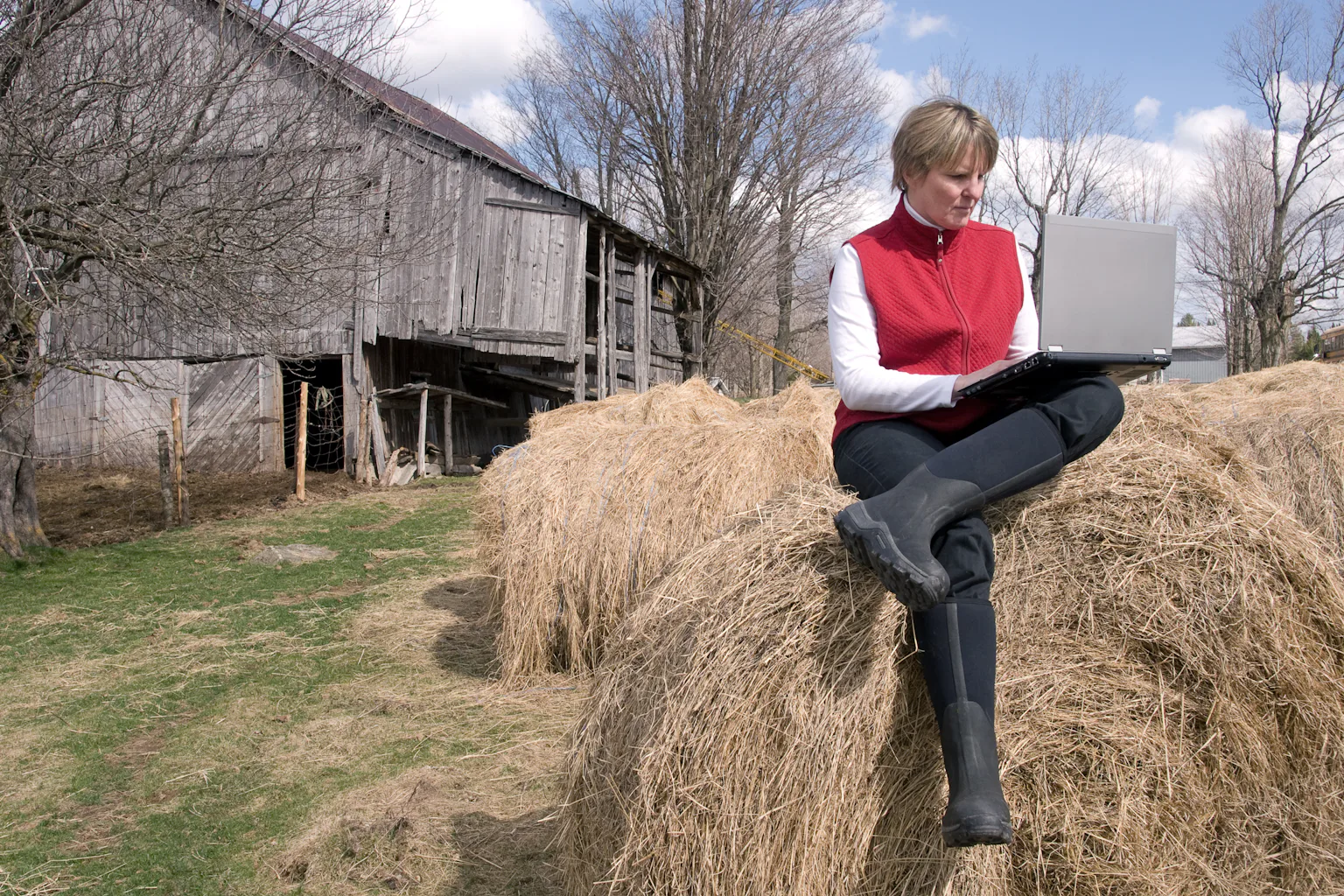 Digital Computer Woman Rural Broadband internet can help rural communities connect – if they use it