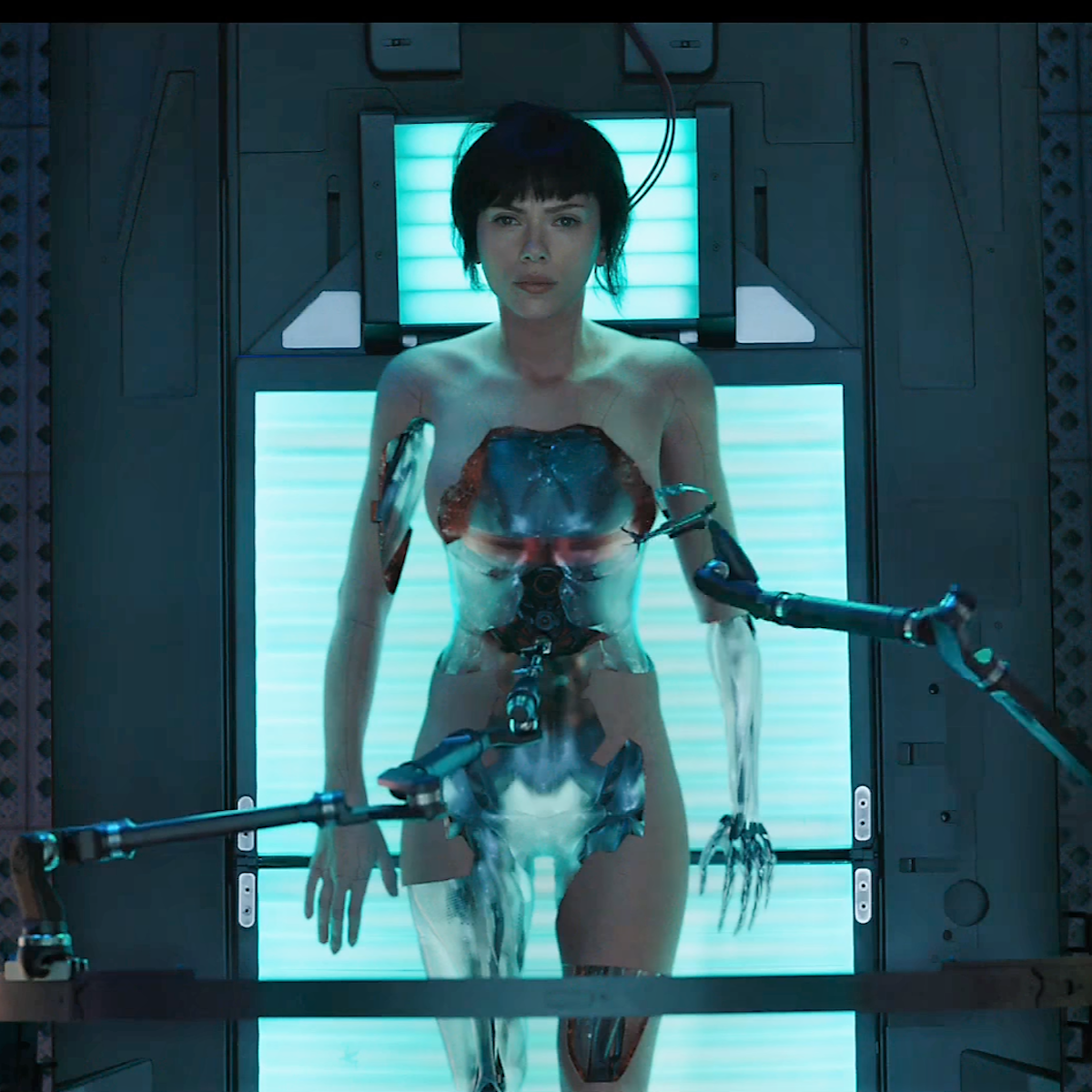 Ghost in the Shell thrills but ducks the philosophical questions posed by a  cyborg future