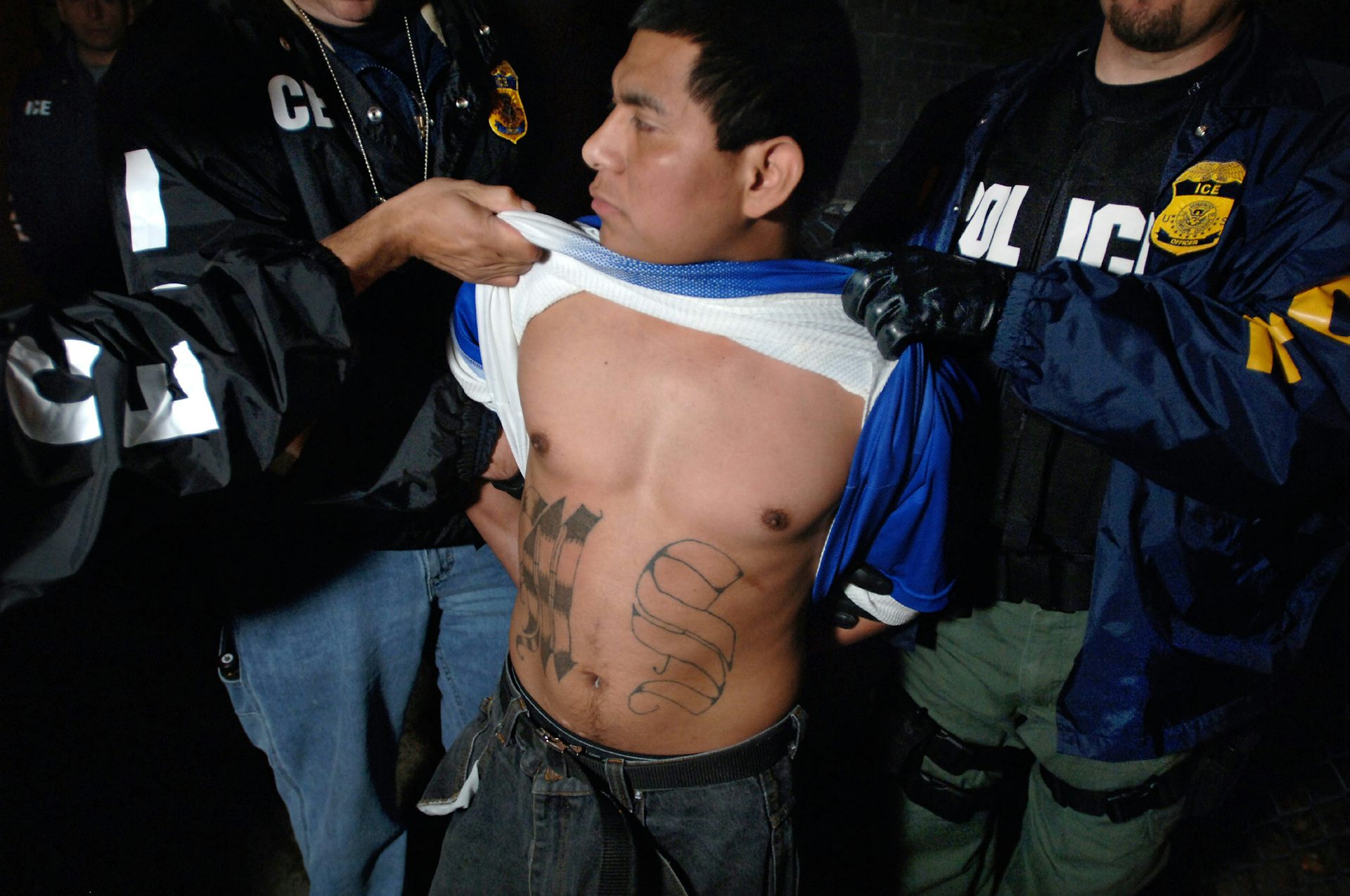 Former gang members in an El Salvadorian prison cross through their  distinctive tattoos  Daily Mail Online