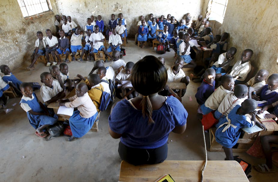 Image result for primary school teacher in class kenya