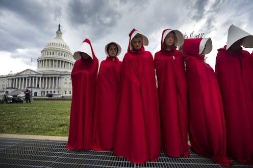 Image result for picture of the women in red handmaids