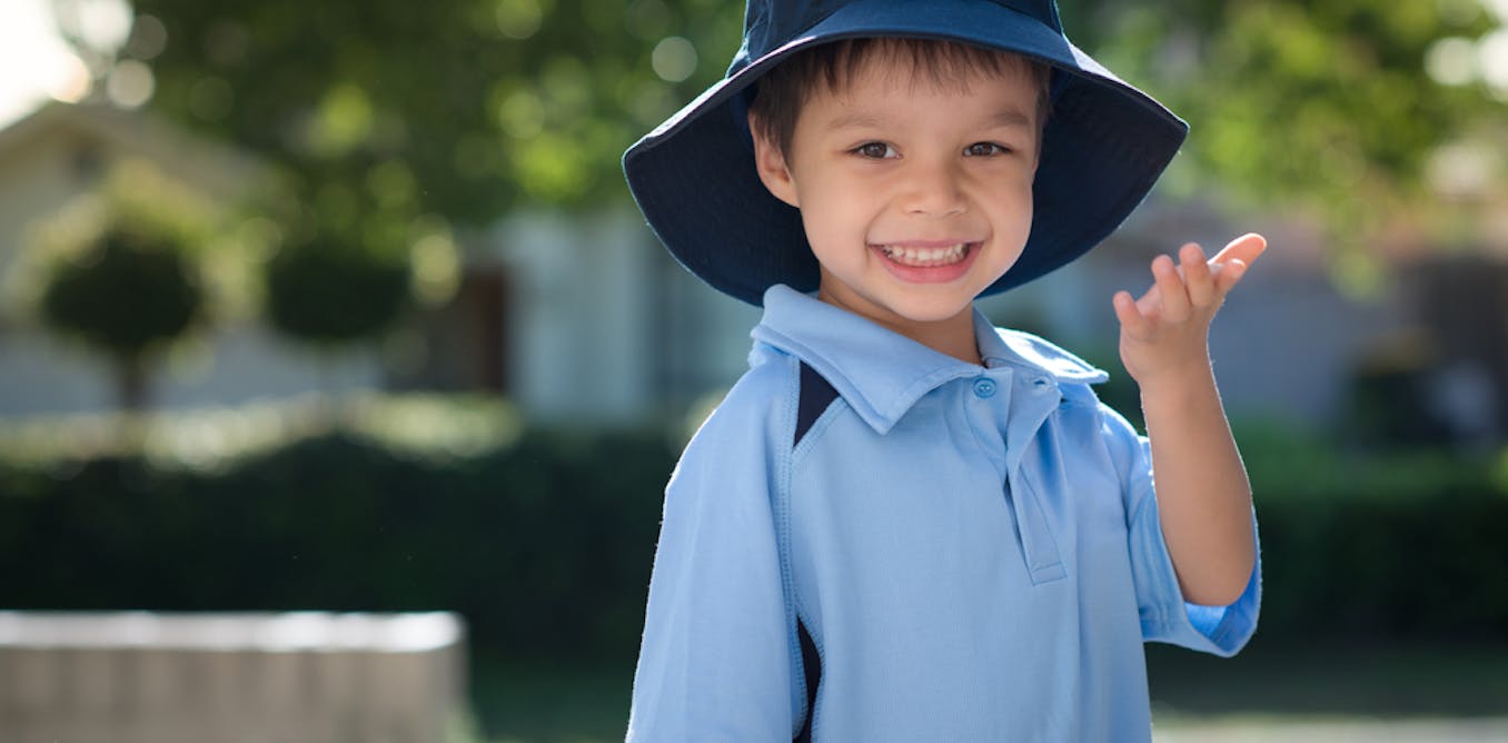 School hat. Kid with University hat.