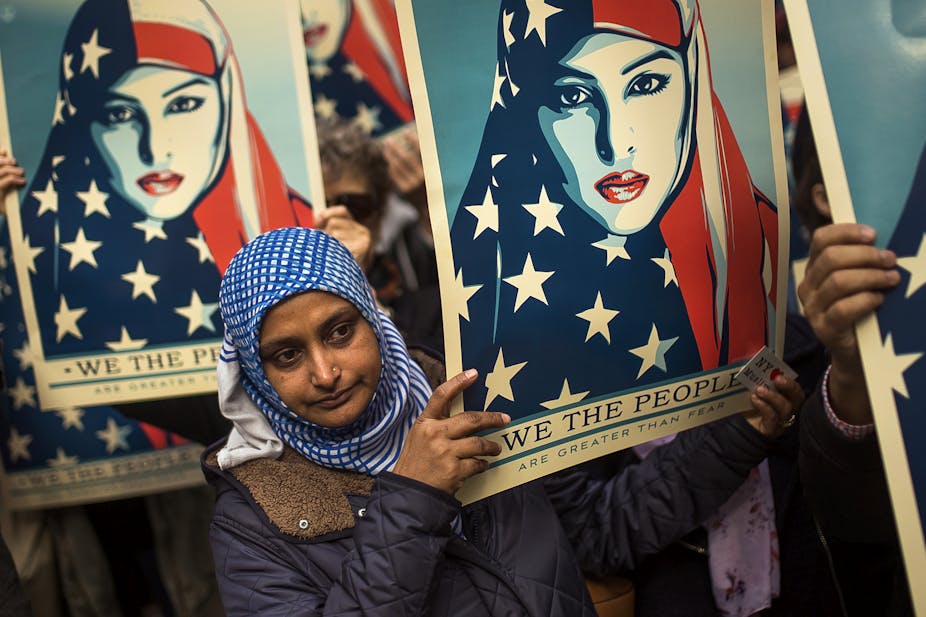 muslim ban trump travel islamophobia islam against america posters americans nations ap donald president majority end anti andres kudacki banning