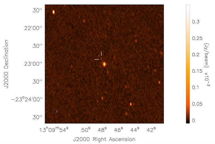 VLA image showing radio emission from the host galaxy NGC 4993 and the associated transient source (in crosshairs). Reprinted with permission from Hallinan et al., Science (2017)