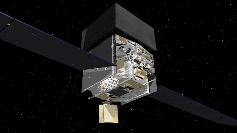 Graphic of NASA’s Fermi satellite. The satellite has two flat wings protruding either side and is comprised of two stacked cube shapes in the centre. It's shown against a backgroun of black with white dots.