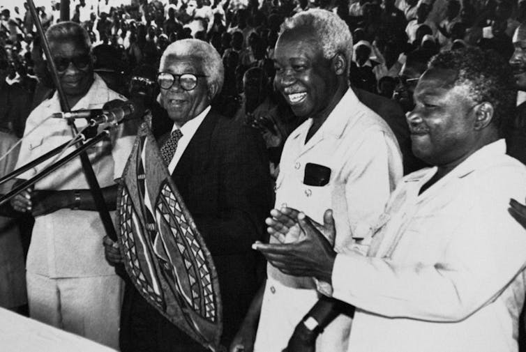 Julius Nyerere (second right), his successor Ali Hassan Mwinyi (right) and Mwinyi’s successor Benjamin Mkapa (left) host South Africa’s Walter Sisulu in January 1990. Reuters/File