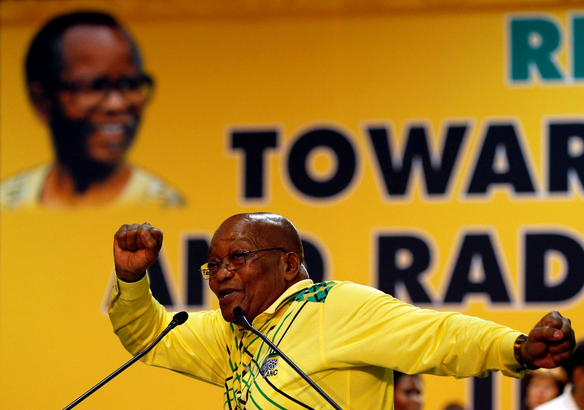 South African President Jacob Zuma sings before his opening address at the 54th National Conference of the governing ANC. Reuters/Siphiwe Sibeko
