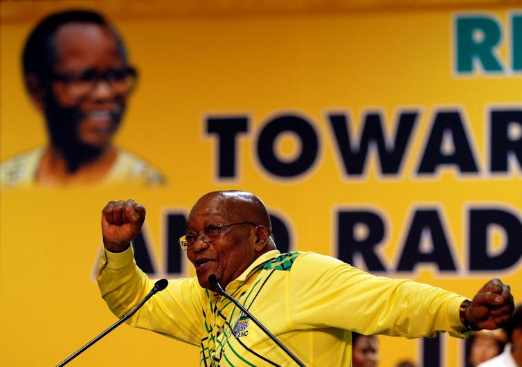 South African President Jacob Zuma sings before his opening address at the 54th National Conference of the governing ANC. Reuters/Siphiwe Sibeko