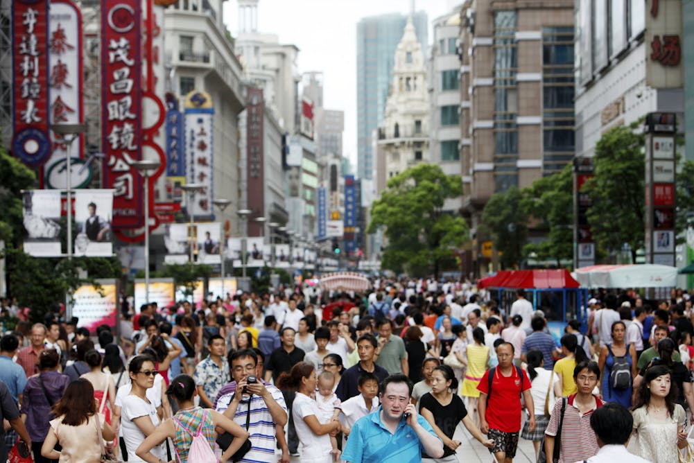 Население китая 2024г. Жители Китая. Китай люди на улице. Пекин население. Современный Китай люди.