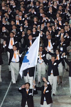 Two Koreas working together on Winter Olympics is a small but important step toward peace