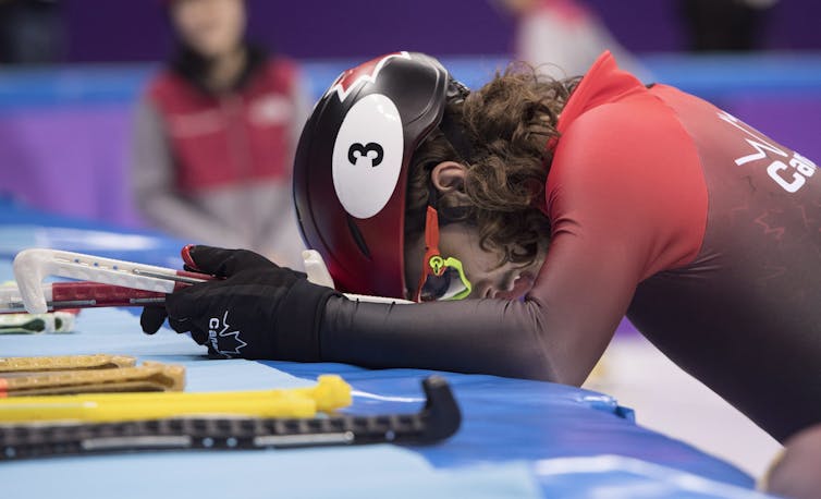 Canada’s Samuel Girard reacts to finishing fourth in the men’s 1500-meter short track final at the 2018 Winter Olympics. (THE CANADIAN PRESS/Paul Chiasson)