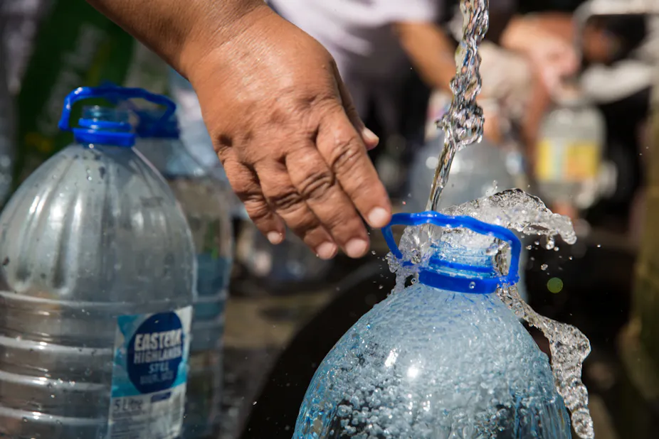 Image result for water outages collecting water