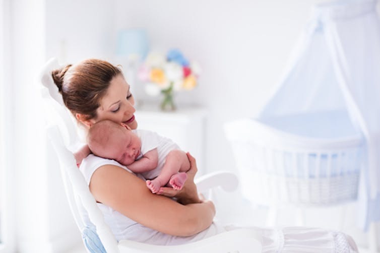 Motherhood is great, but the demands of a new baby can exhaust a new mother. Sleep can become more appealing than sex as a result. FamVeld/Shutterstock.com