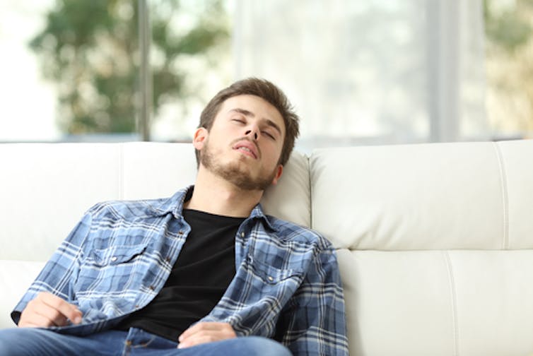 Even young men can lose interest in sex if they are sleep-deprived. Antonio Guillem/Shutterstock.com
