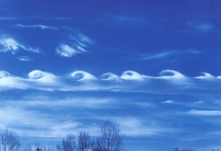 Kelvin-Helmholtz clouds resemble breaking waves in the ocean. (NCAR UCAR OpenSky Repository/CCBY-NC-SA)
