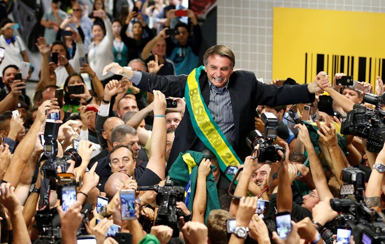 Brazilian candidate still crushing his rivals from jail