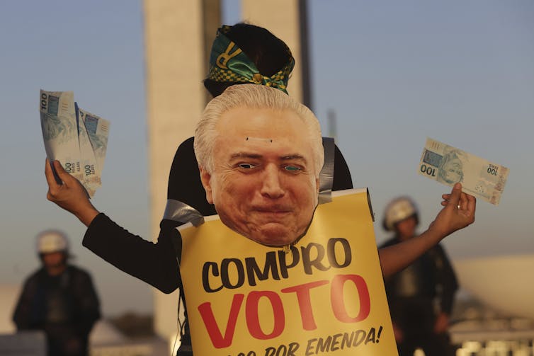 Brazilian candidate still crushing his rivals from jail