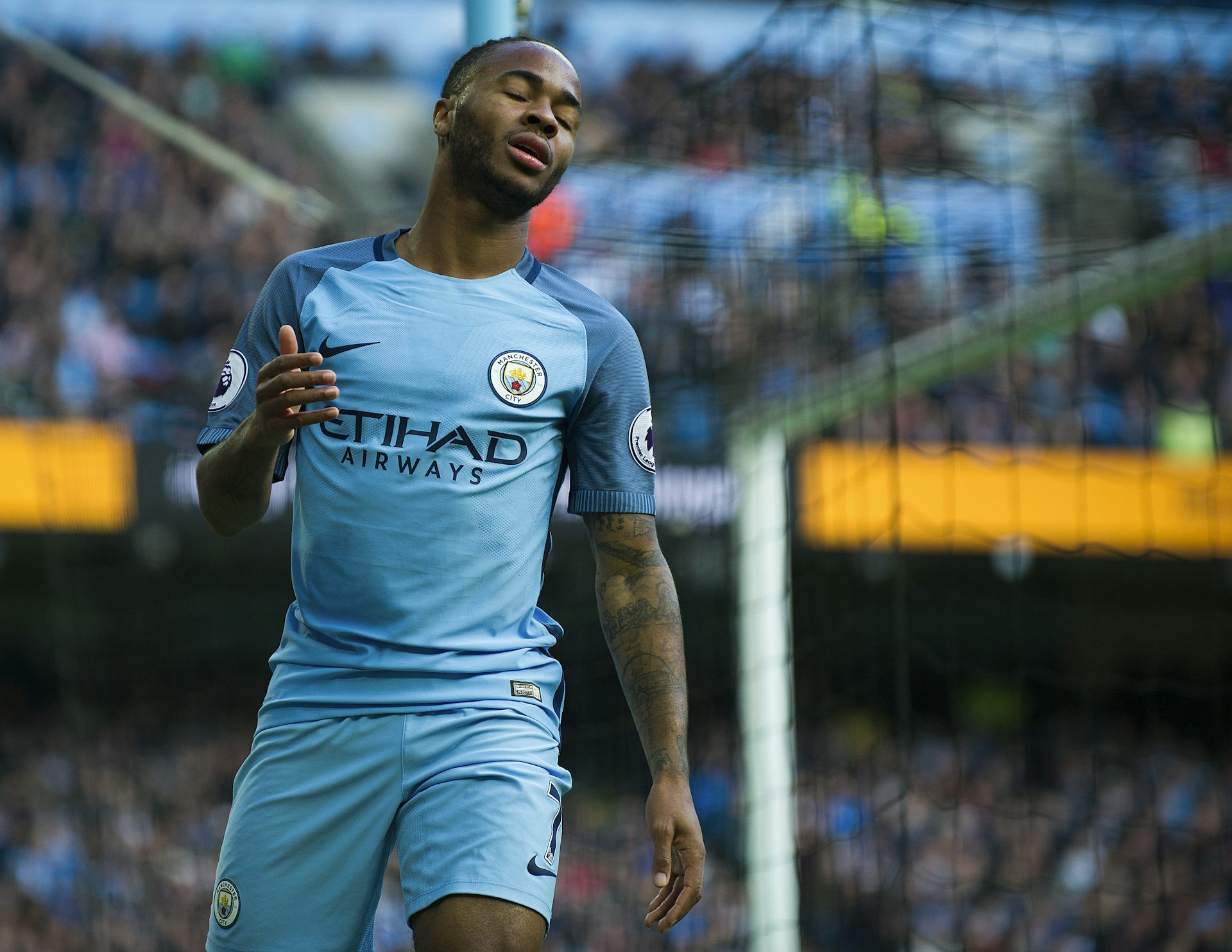 Footballer Raheem Sterling Sparks Outrage After Unveiling Assault Rifle  Tattoo On His Leg Photos  Information Nigeria