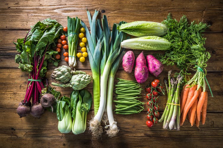 Research has found kids eat more veggies if you’re at the table with them.