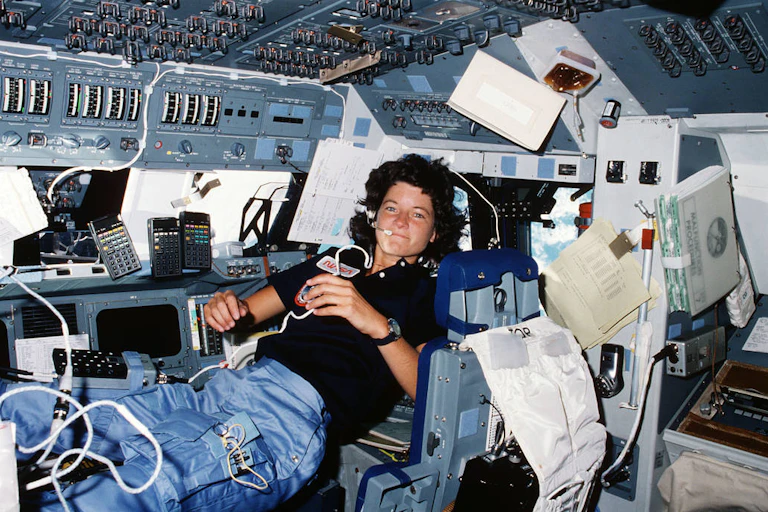 woman in zero gravity in space shuttle