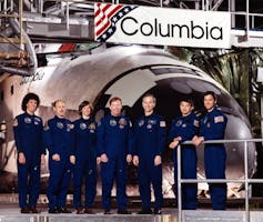 STS-50 Crew photo with commander Richard N. Richards and pilot Kenneth D. Bowersox, mission specialists Bonnie J. Dunbar, Ellen S. Baker and Carl J. Meade, and payload specialists Lawrence J. DeLucas and Eugene H. Trinh