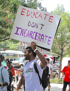 Protesters march through Harlem.