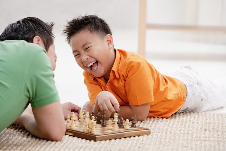 Play games with your kids this summer to boost their brains