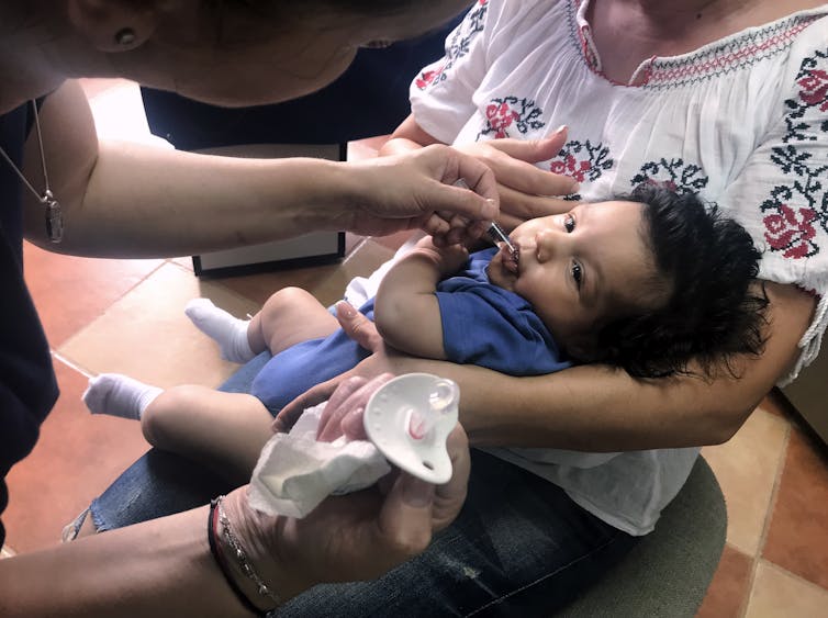 child-in-romania-receives-vaccination