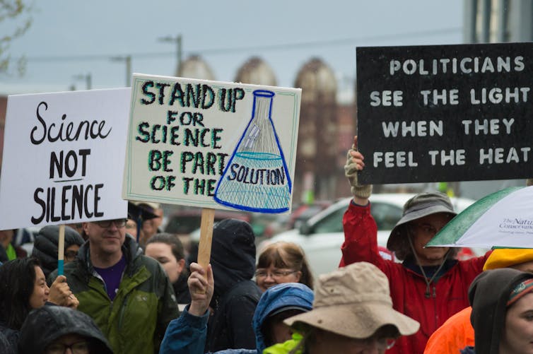 Image of Protesters challenge the suppression of climate change research by President Trump. www.shutterstock.com