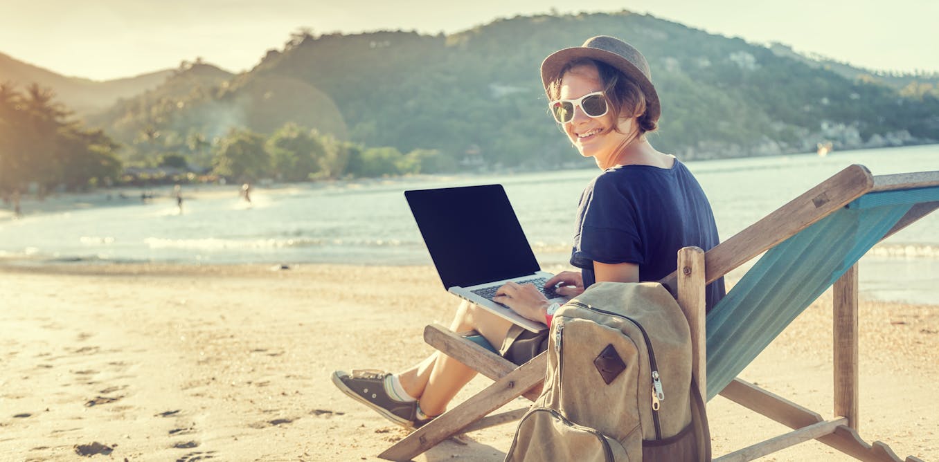 Modern happy ladies travelling enjoying life at the beach on