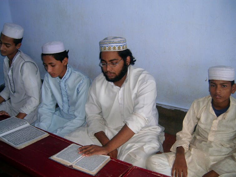 What are madrasa schools and what skills do they impart?