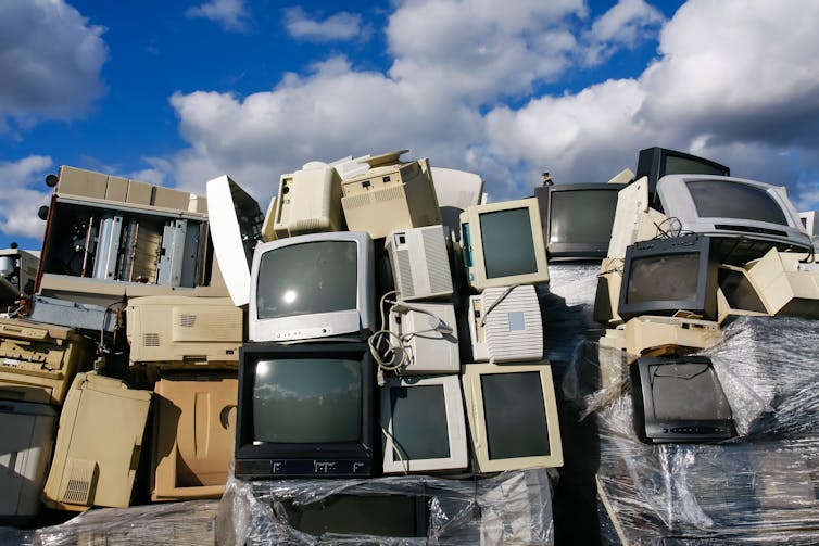 Old television sets at a landfill site