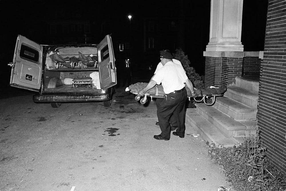 Shooting victims are removed from the Algiers Motel in Detroit, July 26, 1967. AP Photo