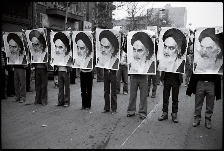 essay questions on iranian revolution