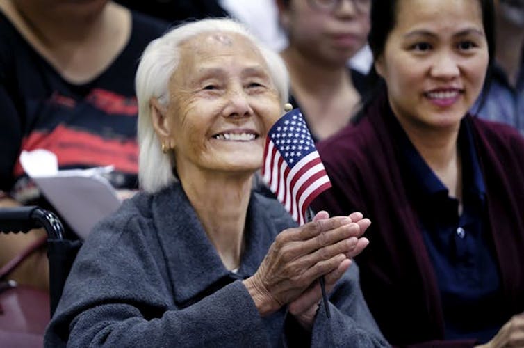 The possibilities for many are endless, such as Hong Inh, 103, experienced when she achieved a life-long dream of American citizenship. (Richard Vogel/AP Photo)