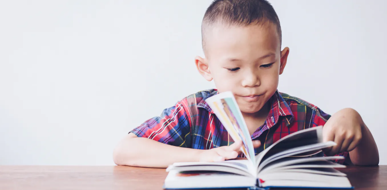 Boy Practicing Reading Six things you can do to get boys reading more