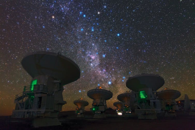 SPACE. The ALMA telescope has seen tantalizing hints of a violent event. ESO/B. Tafreshi/TWAN (twanight.org), CC BY-ND 