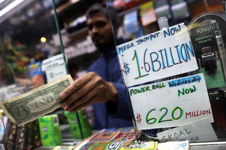 Got the winning lottery ticket? An economist explains what to do with all that money