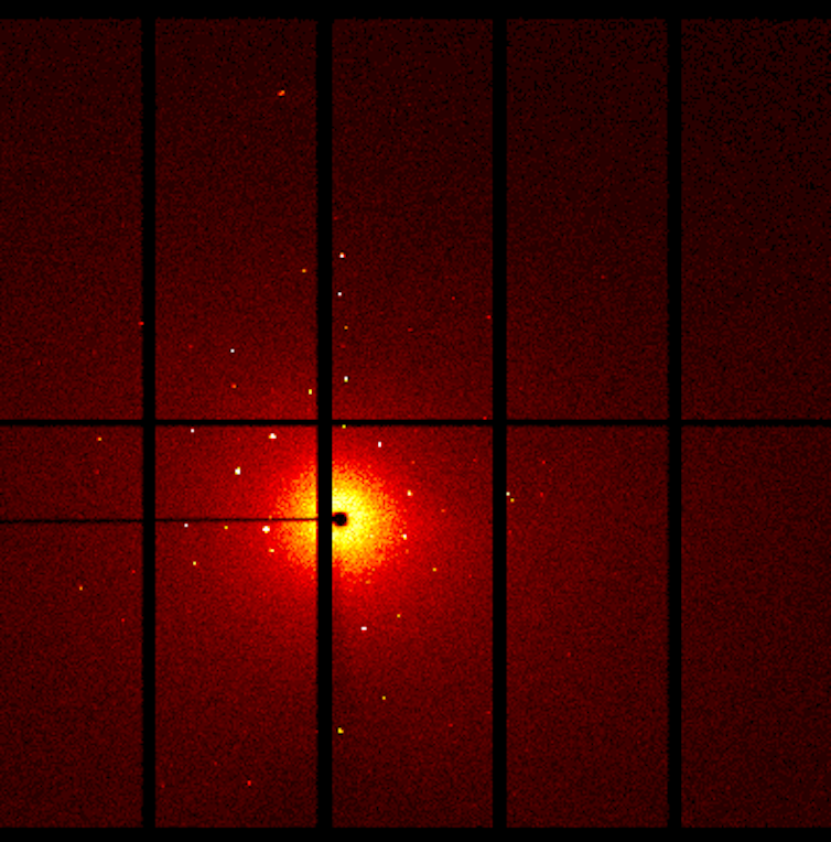 Scientist at work: To take atomic-scale pictures of tiny crystals, use a huge, kilometer-long synchrotron