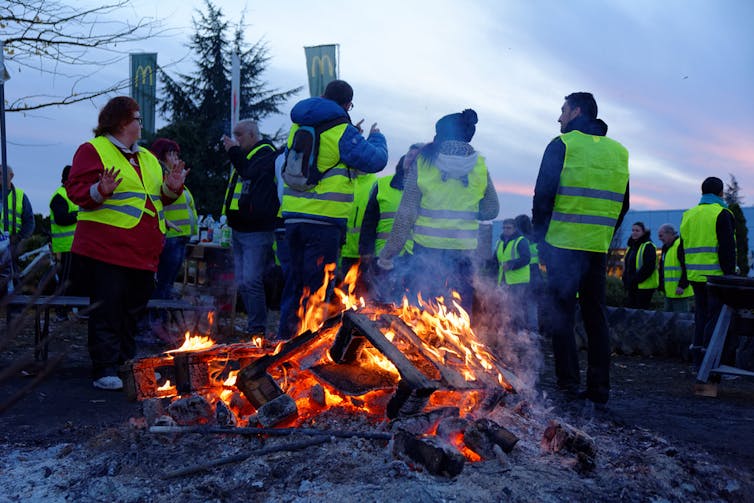 Gilets jaunes: why the French working poor are demanding Emmanuel Macron's  resignation