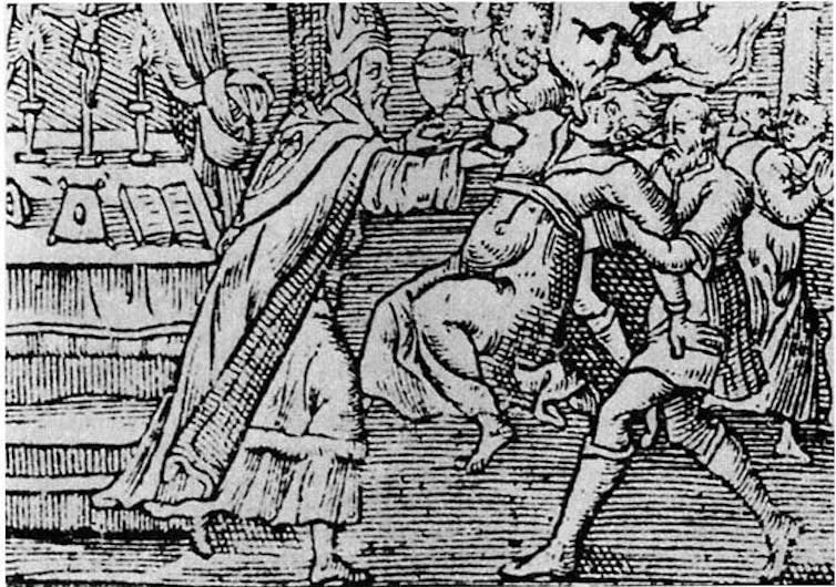 A woodcut from 1598 shows an exorcism performed on a woman by a priest and his assistant, with a demon emerging from her mouth.