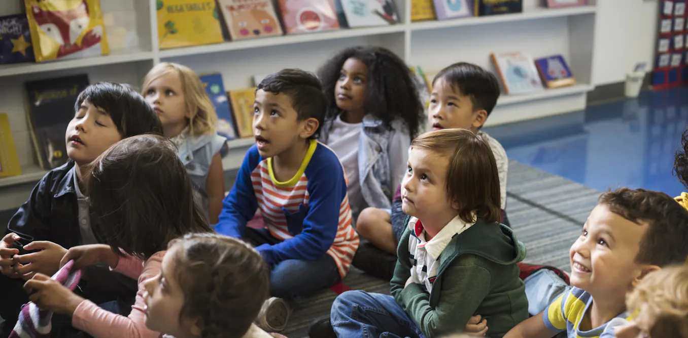 Multicultural Students Studying In Class