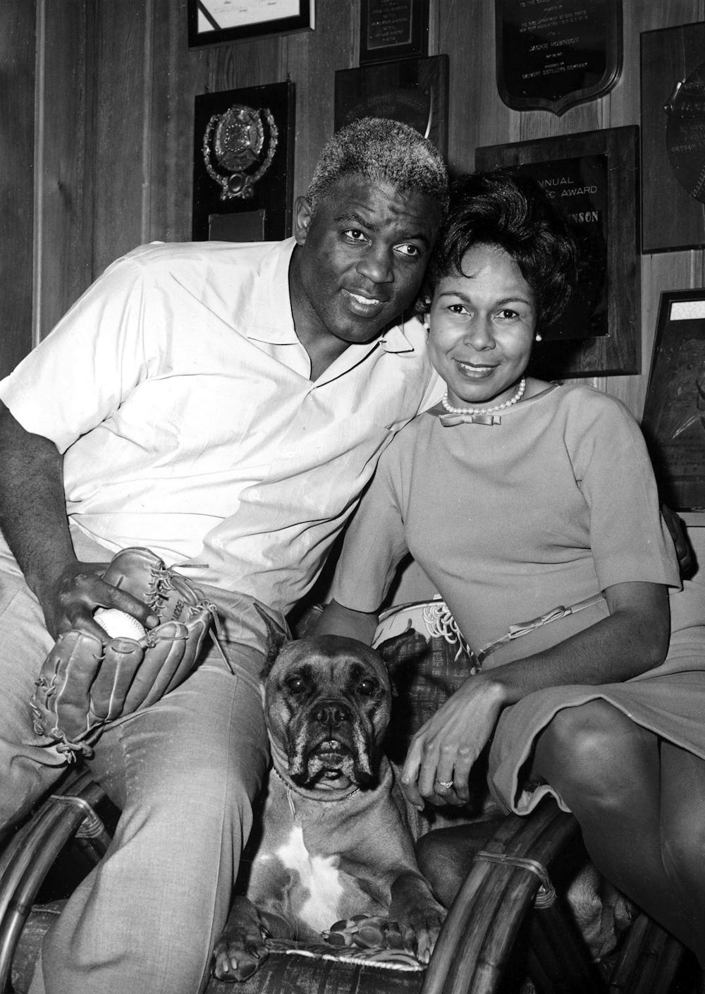 Jackie Robinson, signed by the Brooklyn Dodgers and assigned to the  Montreal Club, holds hands with his bride, the former Rachel Isum in Los  Angeles, Feb. 26, 1946. The couple disclosed in