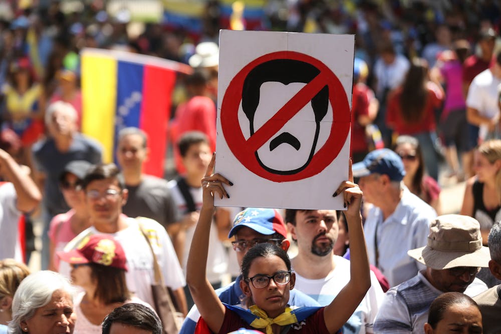 What Caused Hyperinflation In Venezuela A Rare Blend Of Public - venezuelans living in santiago chile protest against the regime of of nicolas maduro on february 2 a huge diaspora of ve!   nezuelans is now spread