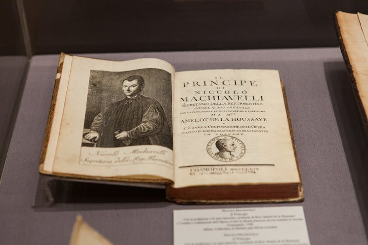 A photograph of Niccolò Machiavelli in a book