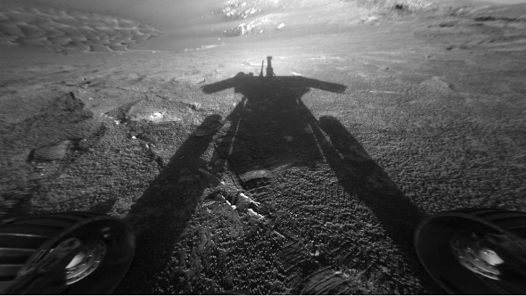 'OPPY'. Shadow case by the NASA rover on Mars. NASA/JPL-Caltech
