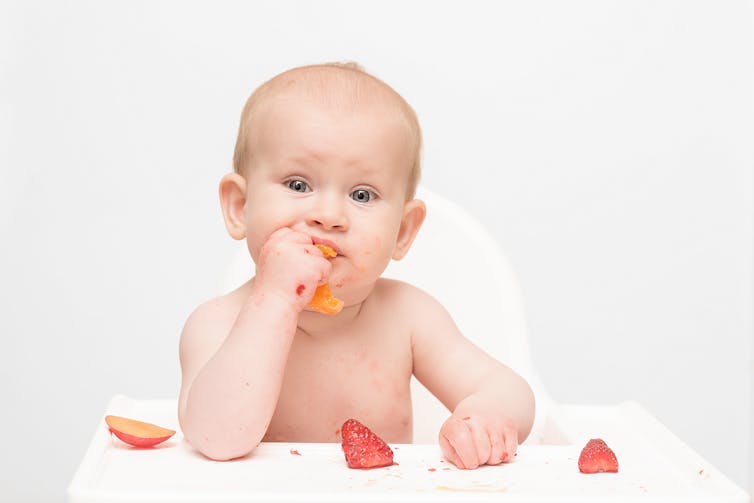 baby-weaning-onto-solids-eating-fruit-but-not-being-spoon-fed